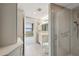 Bathroom featuring granite countertop vanity, marble shower stall, and linen closet at 700 Park Regency Ne Pl # 1203, Atlanta, GA 30326