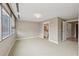 Large bedroom featuring carpeted floors, natural lighting, and attached bathroom at 700 Park Regency Ne Pl # 1203, Atlanta, GA 30326