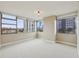 Bright bedroom featuring large windows providing ample light and neutral carpeting at 700 Park Regency Ne Pl # 1203, Atlanta, GA 30326