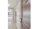 Elegant entryway with views to the living space, featuring tile flooring and modern lighting at 700 Park Regency Ne Pl # 1203, Atlanta, GA 30326
