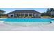 Resort-style pool with fountains and lounge chairs, a fantastic community amenity for relaxing at 8594 Secretariat Dr, Lithonia, GA 30058