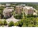 Stunning aerial view of luxurious high-rise buildings surrounded by lush greenery in a vibrant urban setting at 3286 Northside Nw Pkwy # 903, Atlanta, GA 30327