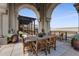 Expansive balcony featuring a dining area with views, complemented by potted plants and architectural details at 3286 Northside Nw Pkwy # 903, Atlanta, GA 30327