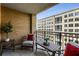 Inviting balcony with outdoor seating showcases city views and tranquil space at 3286 Northside Nw Pkwy # 903, Atlanta, GA 30327