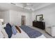 Serene bedroom with a dresser, a sitting area and entrance to the ensuite bathroom at 3286 Northside Nw Pkwy # 903, Atlanta, GA 30327