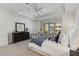Bright and airy bedroom with a ceiling fan, balcony access, and neutral decor at 3286 Northside Nw Pkwy # 903, Atlanta, GA 30327