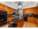 Well-equipped kitchen featuring a large island and granite countertops at 3286 Northside Nw Pkwy # 903, Atlanta, GA 30327