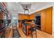 Modern kitchen features wood cabinets, granite counters, and stainless steel appliances at 3286 Northside Nw Pkwy # 903, Atlanta, GA 30327
