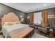 Well-lit bedroom features dark walls, a luxurious bed, and stylish decor at 3286 Northside Nw Pkwy # 903, Atlanta, GA 30327