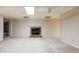 Finished basement with stone fireplace, plush carpeting and ample space for entertaining at 427 Picketts Lake Dr, Acworth, GA 30101