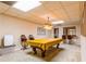Basement with a pool table and chairs at 427 Picketts Lake Dr, Acworth, GA 30101
