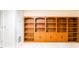 Spacious basement featuring a large built-in wooden bookcase at 427 Picketts Lake Dr, Acworth, GA 30101