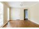 Bright bedroom featuring wood floors, neutral walls, and plenty of natural light at 427 Picketts Lake Dr, Acworth, GA 30101