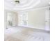 Airy bedroom with French doors to a deck and an open door to a walk-in closet at 427 Picketts Lake Dr, Acworth, GA 30101