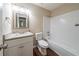 Bathroom featuring a shower-tub combo with a new vanity and wood flooring at 5810 Tree Line Ter, Lithonia, GA 30058