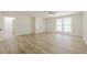 Large bedroom features vinyl plank flooring and lots of natural light at 9985 Lake Forest Way, Roswell, GA 30076