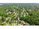 Aerial view of a property showcasing its location within a lush, green neighborhood at 110 Keswick Way, Alpharetta, GA 30022