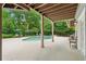 Outdoor living space with a pool, lounge chairs, and lush foliage at 110 Keswick Way, Alpharetta, GA 30022