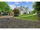 Backyard featuring a play area and outdoor living space at 110 Keswick Way, Alpharetta, GA 30022