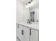 Modern bathroom with a marble countertop, designer mirror, and brushed black fixtures for a sleek look at 110 Keswick Way, Alpharetta, GA 30022