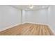 Neutral room features hardwood floors, recessed lighting, and a ceiling fan at 110 Keswick Way, Alpharetta, GA 30022