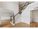 Grand foyer with a staircase, hardwood floors, and an open design for a bright and airy feel at 110 Keswick Way, Alpharetta, GA 30022