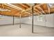 Unfinished basement with exposed beams, concrete flooring, and utilities in view at 2813 Hillside Rd, Smyrna, GA 30080