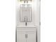 Modern bathroom vanity with gold hardware and a sleek black faucet at 2813 Hillside Rd, Smyrna, GA 30080