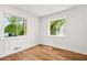 Bright bedroom with two windows and hardwood flooring at 2813 Hillside Rd, Smyrna, GA 30080