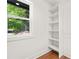 Walk in closet features built-in shelving units, providing ample storage space at 2813 Hillside Rd, Smyrna, GA 30080