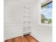 Spacious walk-in closet with built-in shelving and a window at 2813 Hillside Rd, Smyrna, GA 30080