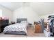 Bedroom with a bed, dresser, and desk providing ample space at 5857 Cobalt Dr, Powder Springs, GA 30127
