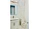 Stylish bathroom with modern mirror, white vanity, and luxurious tile work at 2964 Old Peachtree Rd, Dacula, GA 30019