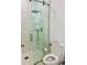 Modern bathroom with glass shower, white tile, and updated fixtures at 2964 Old Peachtree Rd, Dacula, GA 30019