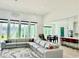 Spacious open-plan living room area with comfortable seating and stylish design at 2964 Old Peachtree Rd, Dacula, GA 30019