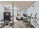 Finished basement gym featuring a variety of exercise equipment and neutral decor at 263 Lynn Dr, Fayetteville, GA 30215