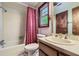 Main bathroom with tub and shower, and a wood vanity at 263 Lynn Dr, Fayetteville, GA 30215