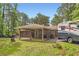 Charming home with a covered carport offering space for outdoor activities and adjacent RV parking at 263 Lynn Dr, Fayetteville, GA 30215