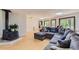 Spacious living room featuring a cozy fireplace, and large sectional sofa perfect for entertaining at 263 Lynn Dr, Fayetteville, GA 30215