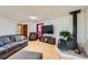 Relaxing living room with hardwood floors, ample seating, wood burning stove, and natural lighting for comfort at 263 Lynn Dr, Fayetteville, GA 30215