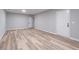 Spacious basement with modern flooring and neutral paint, offering a blank canvas for customization at 5139 Coolamber Dr, Powder Springs, GA 30127