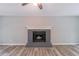 Close-up of the brick fireplace, a focal point in the light and airy living room at 5139 Coolamber Dr, Powder Springs, GA 30127