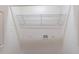 Inside a laundry room with connections for washer/dryer and a wire rack shelf for storage at 5139 Coolamber Dr, Powder Springs, GA 30127