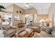 Spacious living room with vaulted ceiling, neutral decor, and an open layout at 6990 N Glen Dr, Cumming, GA 30028