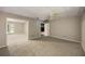 Spacious finished basement with carpet, neutral walls, and access to the outdoors at 2912 Dunhill Trl, Woodstock, GA 30189