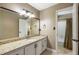 Bathroom with a granite countertop vanity, framed mirror, and a shower with a curtain at 2912 Dunhill Trl, Woodstock, GA 30189