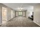 Expansive bedroom with a ceiling fan, neutral walls, and carpet flooring with a connected bathroom at 2912 Dunhill Trl, Woodstock, GA 30189