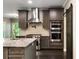 Well-appointed kitchen with stainless steel appliances, granite countertops, and custom cabinetry at 2912 Dunhill Trl, Woodstock, GA 30189