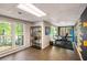 Finished basement office space with large windows looking out to greenery at 2912 Dunhill Trl, Woodstock, GA 30189