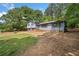 Two story home with a garage and brick and siding exterior at 302 Cardinal Dr, Woodstock, GA 30188